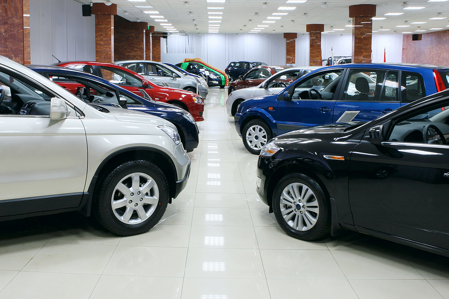 New fuel efficient SUV's on a car dealers lot for sale.