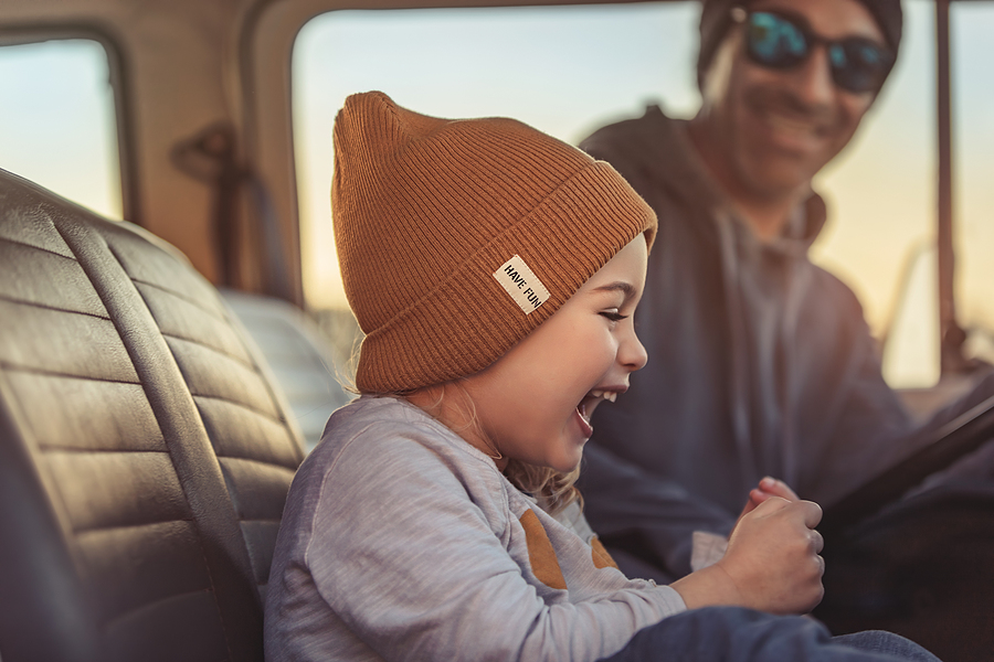 Father with his Little Baby Boy in the Car. Enjoying Road Trip Adventures. Active People. Laughing and with Pleasure Spending Time Together. Happy Family Life.