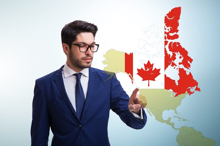 Man with glasses and suit Canada map